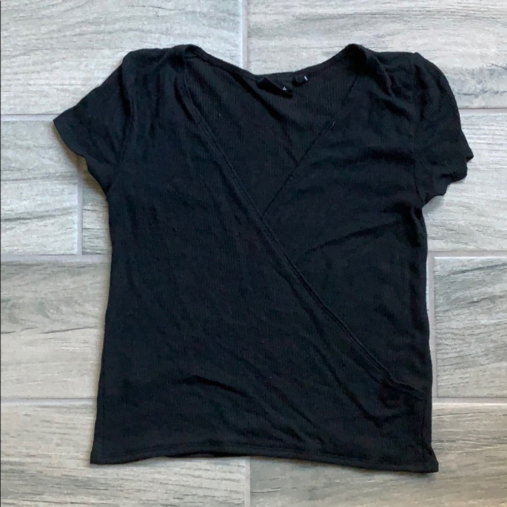 Out from under black criss cross t-shirt